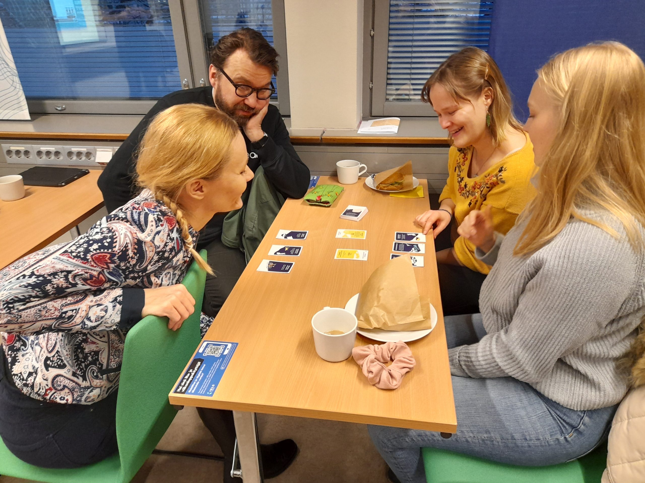 People playing Climate Call during an event to launch the game in Finland.