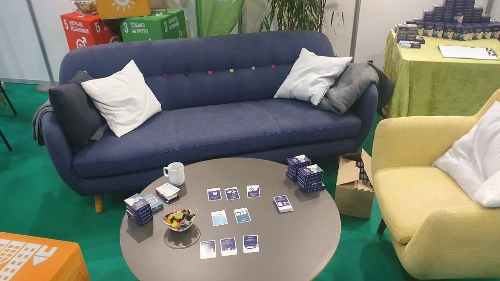 Game area at the launch event for Klimacool at the Big Bang Conference in Odense, March 2025, with teachers trying out the Climate Call card game